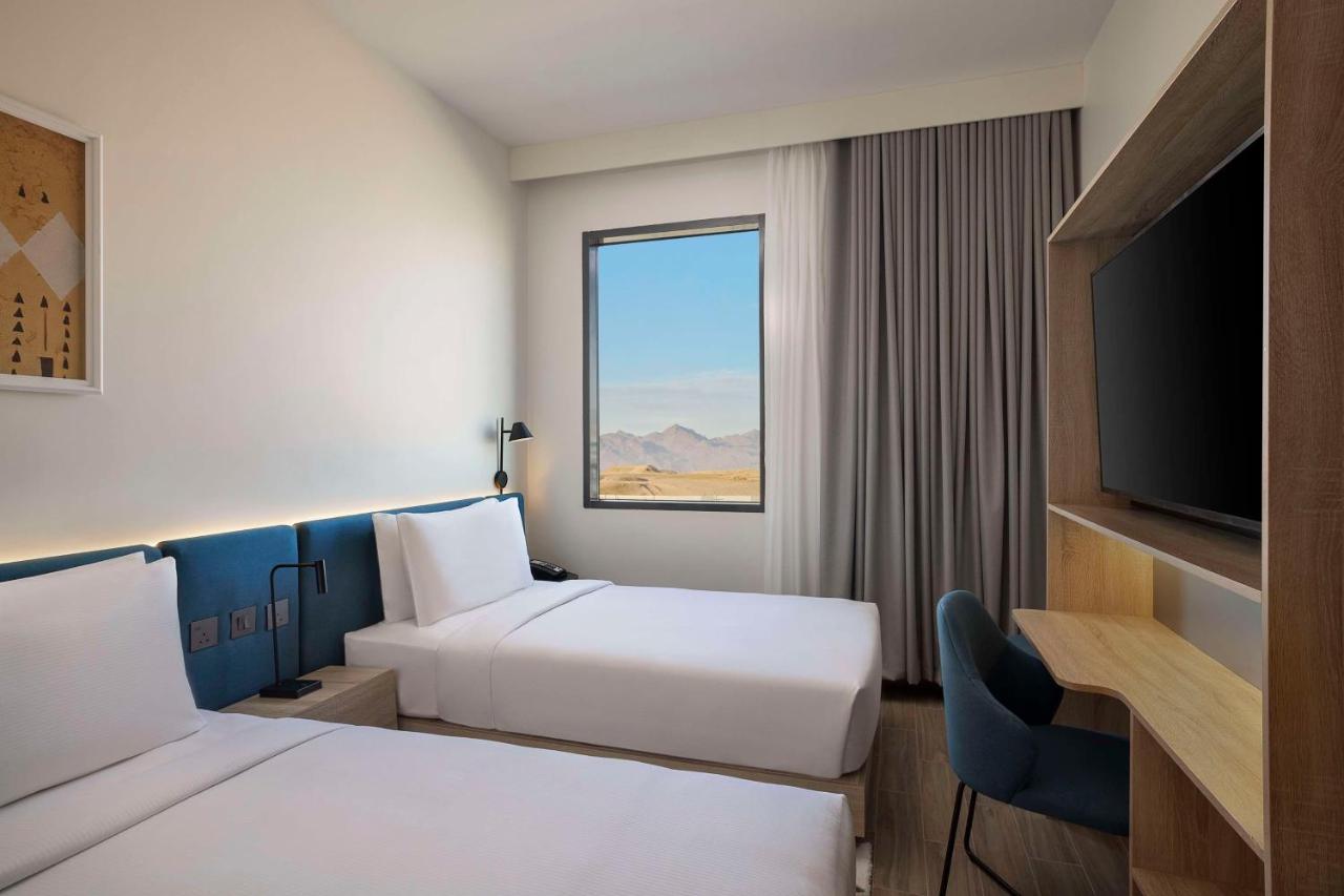 Hampton by Hilton I & II